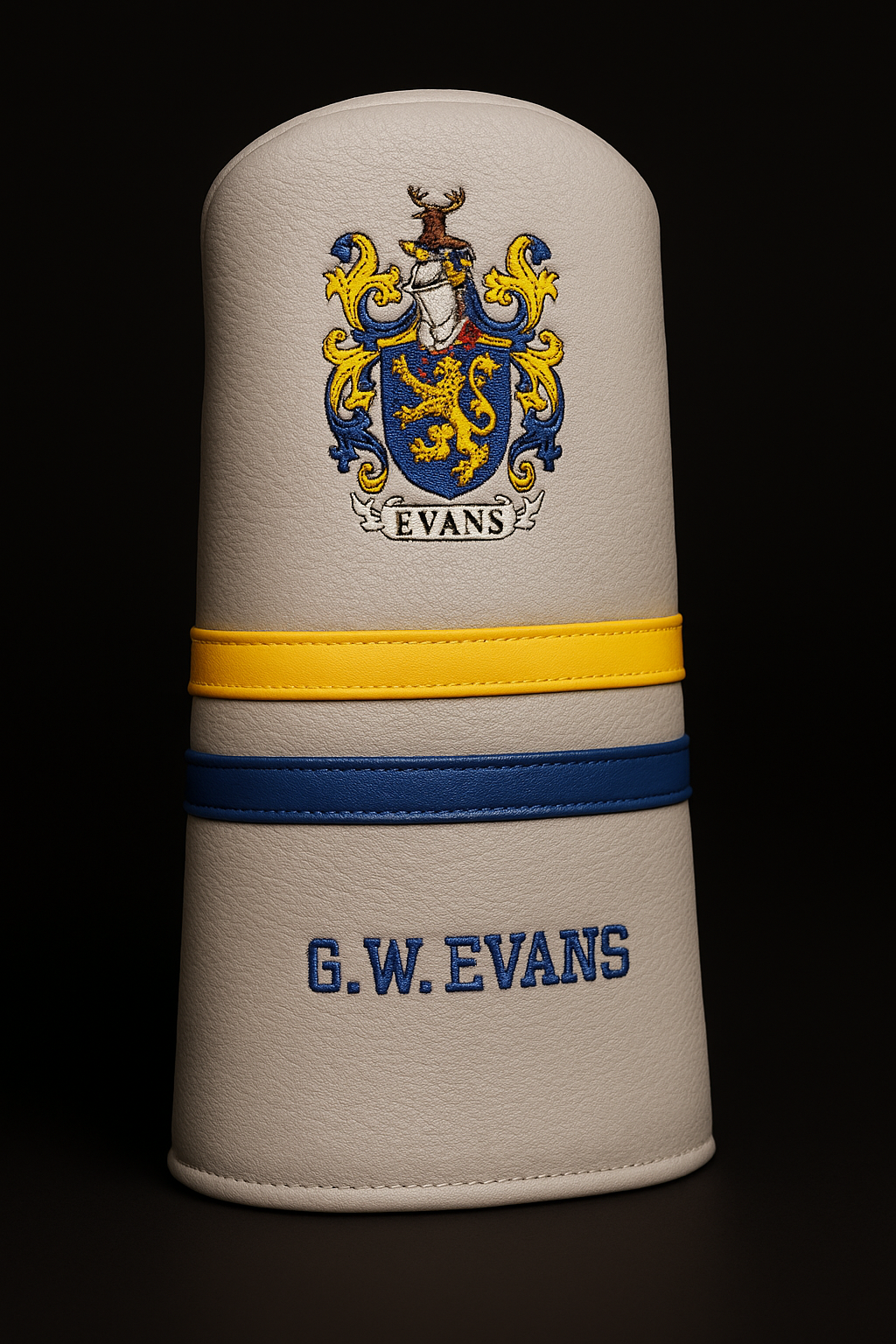 Golf club head cover with 'Evans' logo and text on a black background