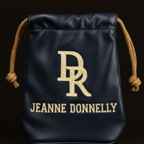 Black drawstring bag with gold logo and text on a black background