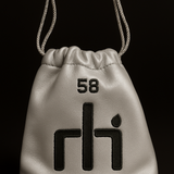 Silver drawstring bag with black logo and number 58 on a black background