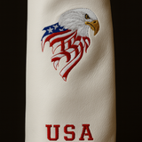 White golf club head cover with an eagle and 'USA' design on a black background