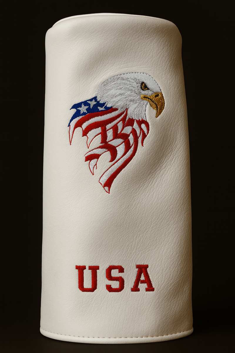 White golf club head cover with an eagle and 'USA' design on a black background